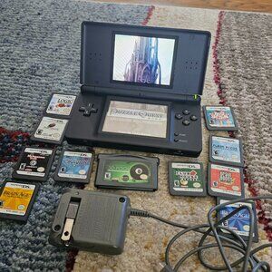 Nintendo DS Lite Black, with stylus, charger, and 11 games